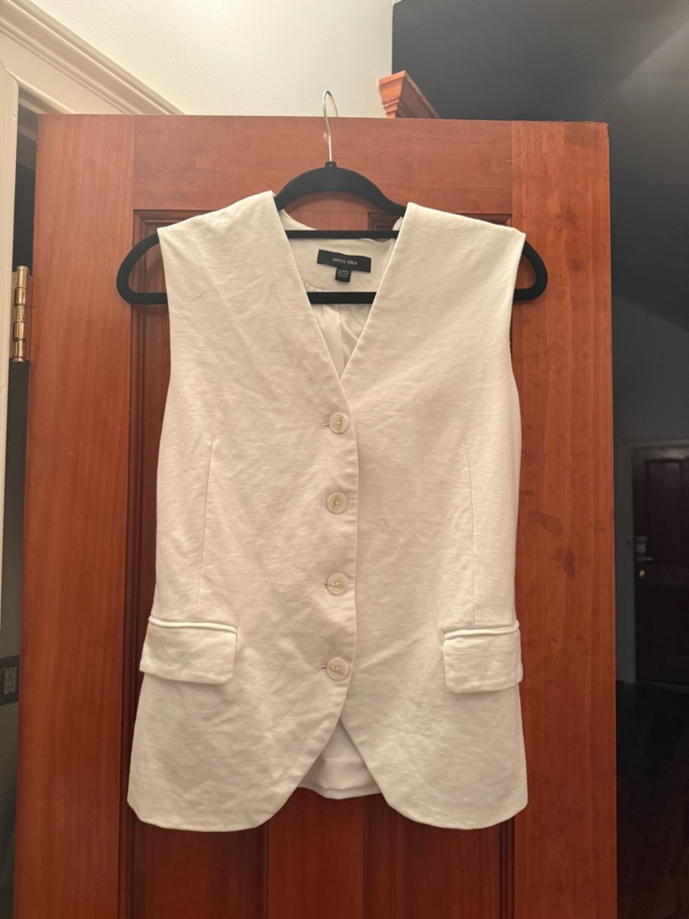White Sleeveless Button Vest
